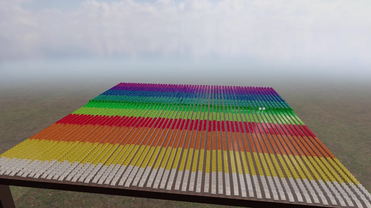Thousands of dominoes in rainbow stripes