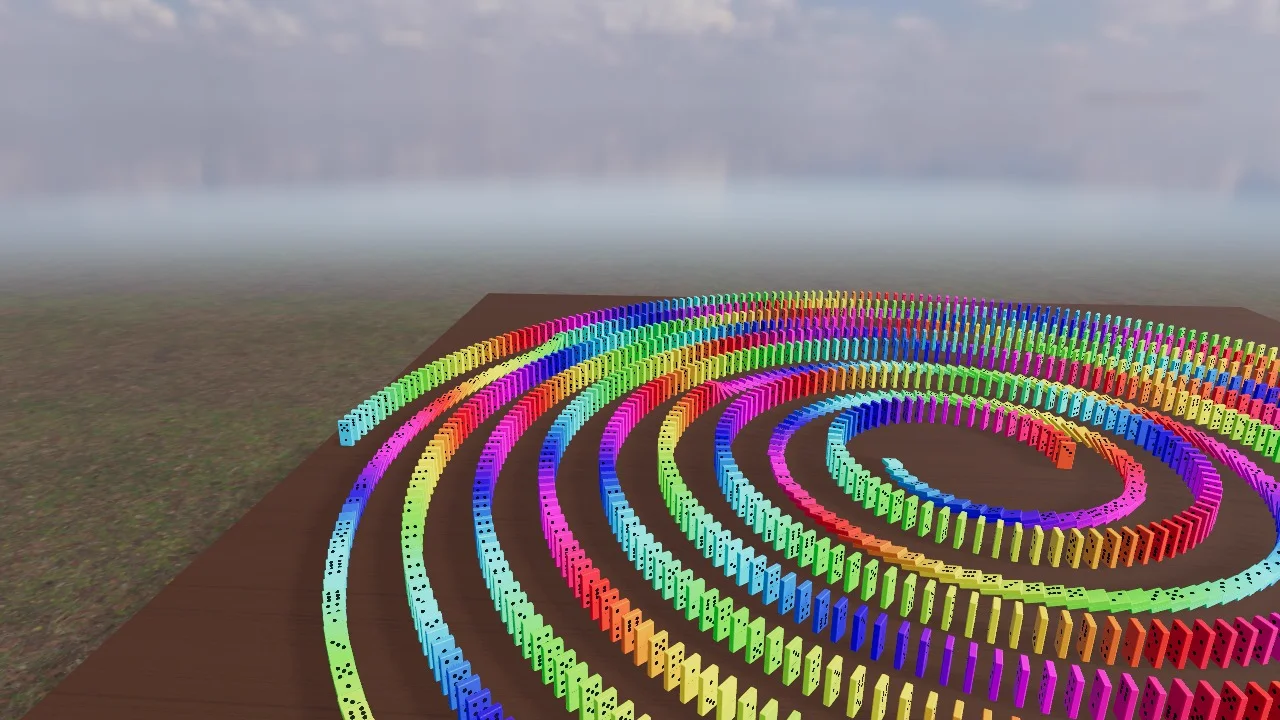 A rainbow spiral of dominoes unwinding